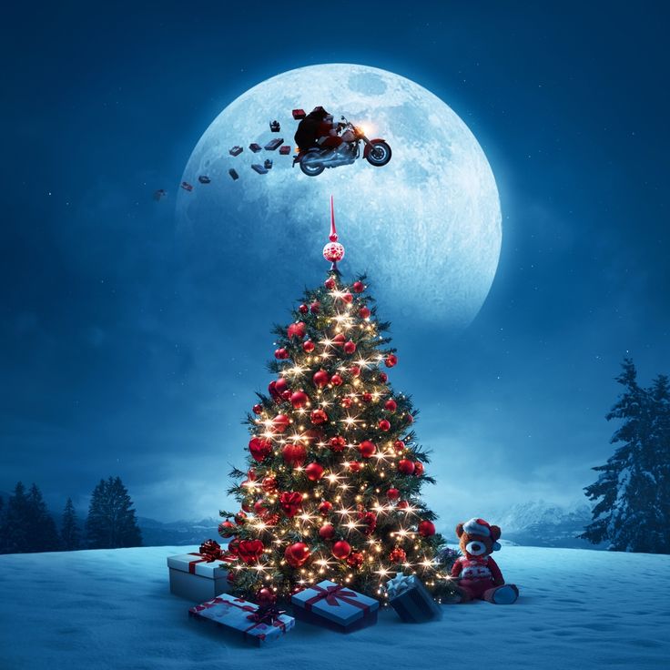 a christmas tree with lights and presents in the sky